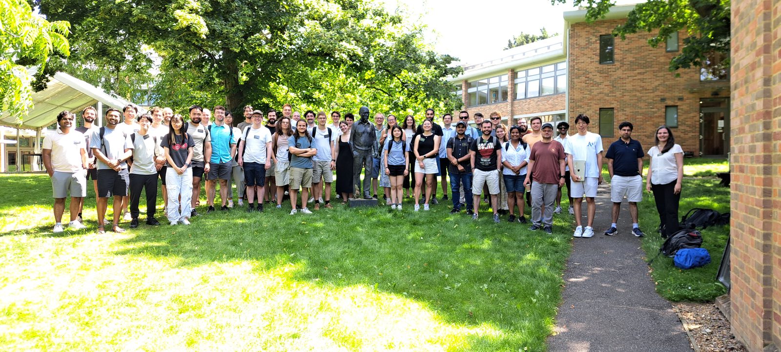 Group photo of SBI for Galaxy Evolution 2026 participants outside the Kavli Institute for Cosmology, Cambridge
